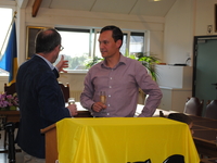 schepen Wim Mommaers met gastspreker Peter de Roover
